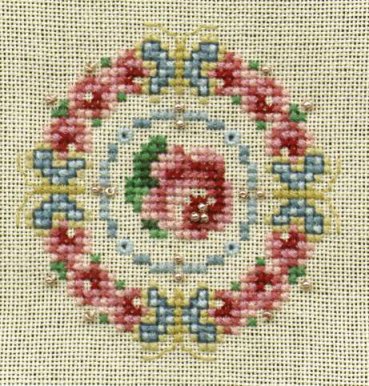 Butterfly Wreath
<p>I believe this was a project I made at a stitching retreat long ago.&nbsp; I seem to recall it was a Just Nan design.&nbsp; It's stitched on evenweave, over two.&nbsp; Just a guess about the fabric count...I'm guessing it was 28 count.&nbsp; There are some beaded embellishments in this piece</p>
Keywords: cross stitch