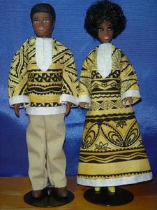 Tribal Tradition
This was a duo set made for male and female. Dale's caftan and Van's dashiki are made of a batik-print cotton. Van's slacks are also done in khaki cotton twill. The caftan and dashiki are trimmed in cotton twill-tape, hand-stitched to the front, sleeves and hems.
