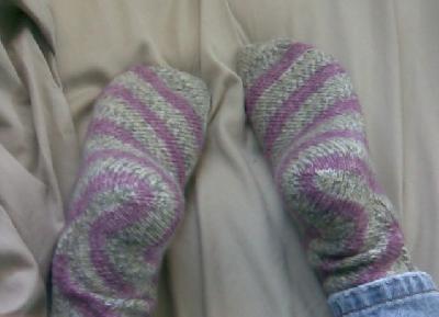 Skew socks- v4
<p>This is the bottoms of both socks.&nbsp; I was holding my cell phone behind me when I snapped this. I think it took me 3 tries to get my feet centered in the shot.&nbsp; :-)</p>
Keywords: knit