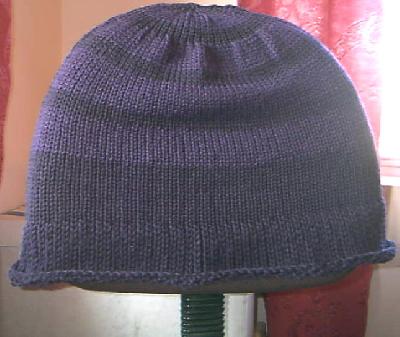 Fresh off the needles and seamed
<p>This is placed over the back of the office chair I use at my knitting machine.&nbsp; This is how big they are before the washing machine.</p>
