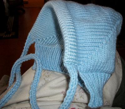Other side
<p>You can see with the side views that there are two colors of yarn.&nbsp; The inside is Caron Simply soft for warmth and comfort.&nbsp; The outside is Red Heart.</p>
