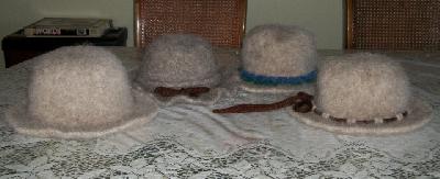 All four again
<p>The brown hat band embellishment is I-cord made with Caron's Embellish Knit.&nbsp; They're made of Caron Simply Soft</p>
