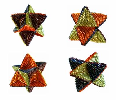 Star Tetrahedron
<p>dipyramids, shown with all four colors used in the star. done in size 11 delicas. pattern by glenda payseno at <a href=