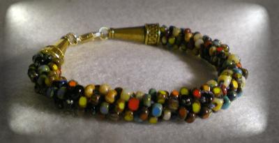 Picasso Dreams
Kumihimo braid with size 8 three cut picasso finish beads.
Keywords: bracelet