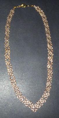 Swarovski V Necklace
<p>Made with 4mm, 5mm, and 6mm peach swarovski crystals.</p>
Keywords: necklace