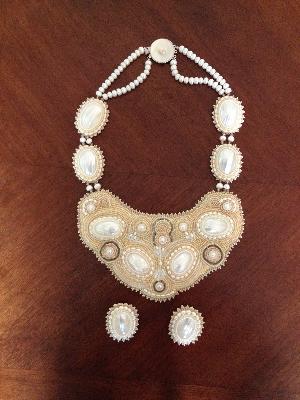 Pearl Wedding Set
<p>This lovely set was done for a wedding that was called off at the last minute... For the best, I guess.</p>
<p>Mother of pearl cabochons, fresh water pearls and a custom mother of pearl and silver box clasp. The earrings are post-back.&nbsp;</p>

