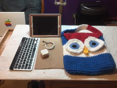 iPad and Keyboard Bag
<p>I made this pattern up myself using Bernat Blanket yarn. I created it so the stand I have (it folds up) could sit along the side (inside of the case). The keyboard fit and I had a small pocket for the plugin adapter, and the iPad slipped right in. Behind the beak is a button that keeps the flap in place,</p>
Keywords: owl